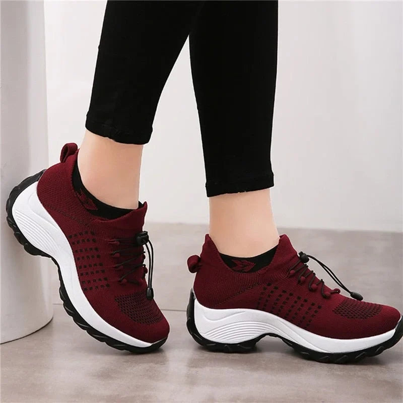 Women's comfort knit slip-on walking shoes with toggle-lace closure