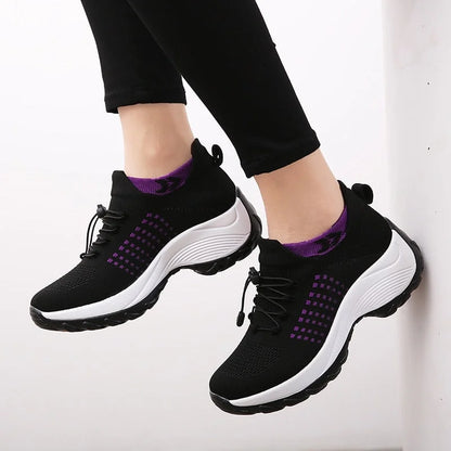 Women's comfort knit slip-on walking shoes with toggle-lace closure