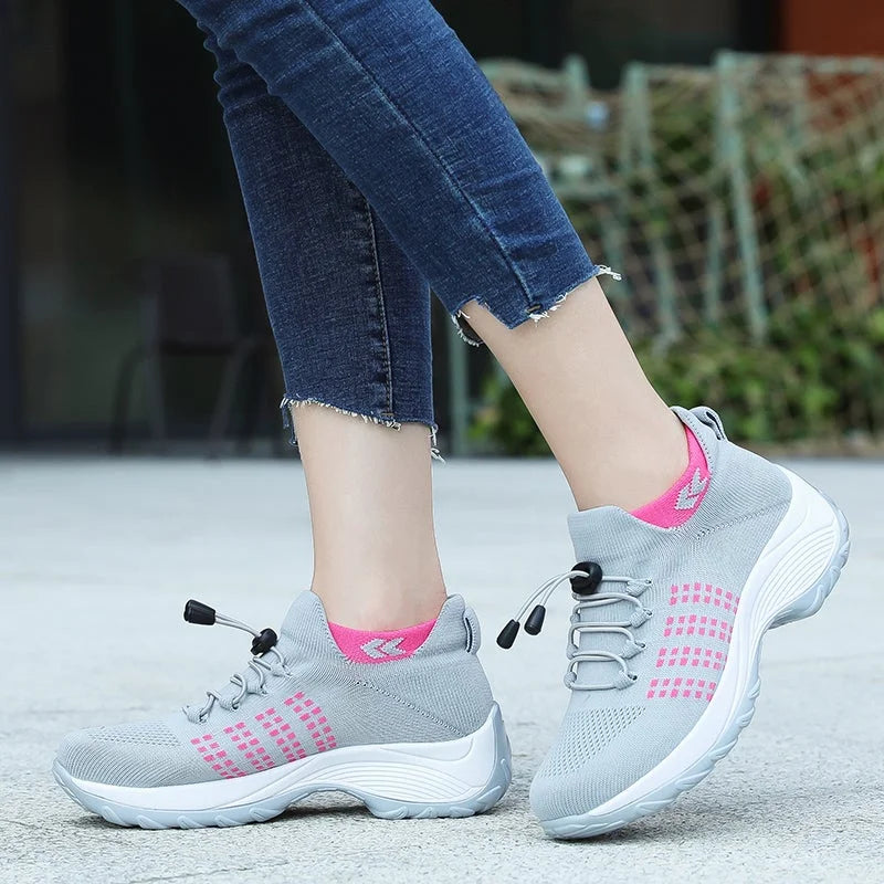 Women's comfort knit slip-on walking shoes with toggle-lace closure