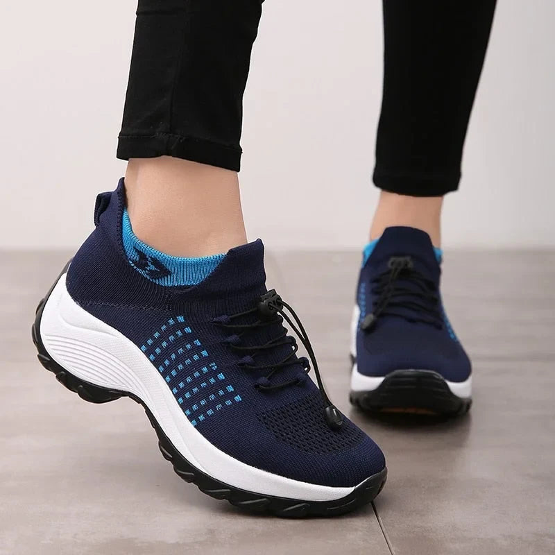 Women's comfort knit slip-on walking shoes with toggle-lace closure