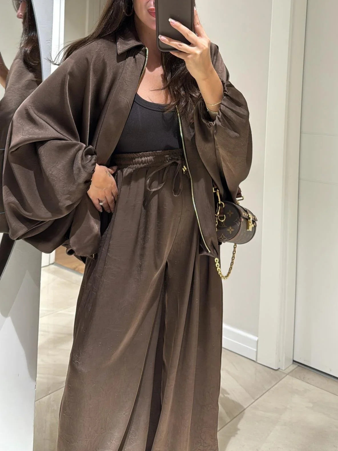 Women's oversized denim jacket with front closure and drawstring wide-leg pants