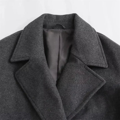Women's oversized double-breasted wool coat with wide lapel design