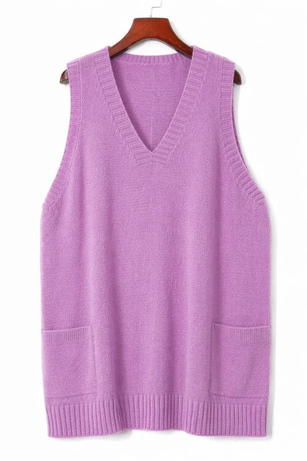 Women's oversized knit vest with V-neck sleeveless tunic length and patch pockets