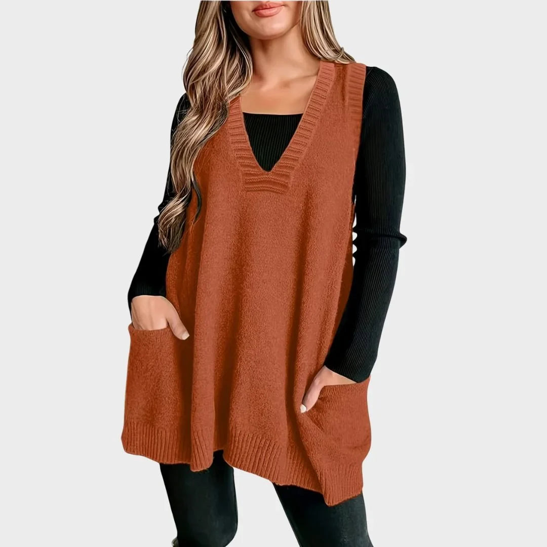 Women's oversized knit vest with V-neck sleeveless tunic length and patch pockets