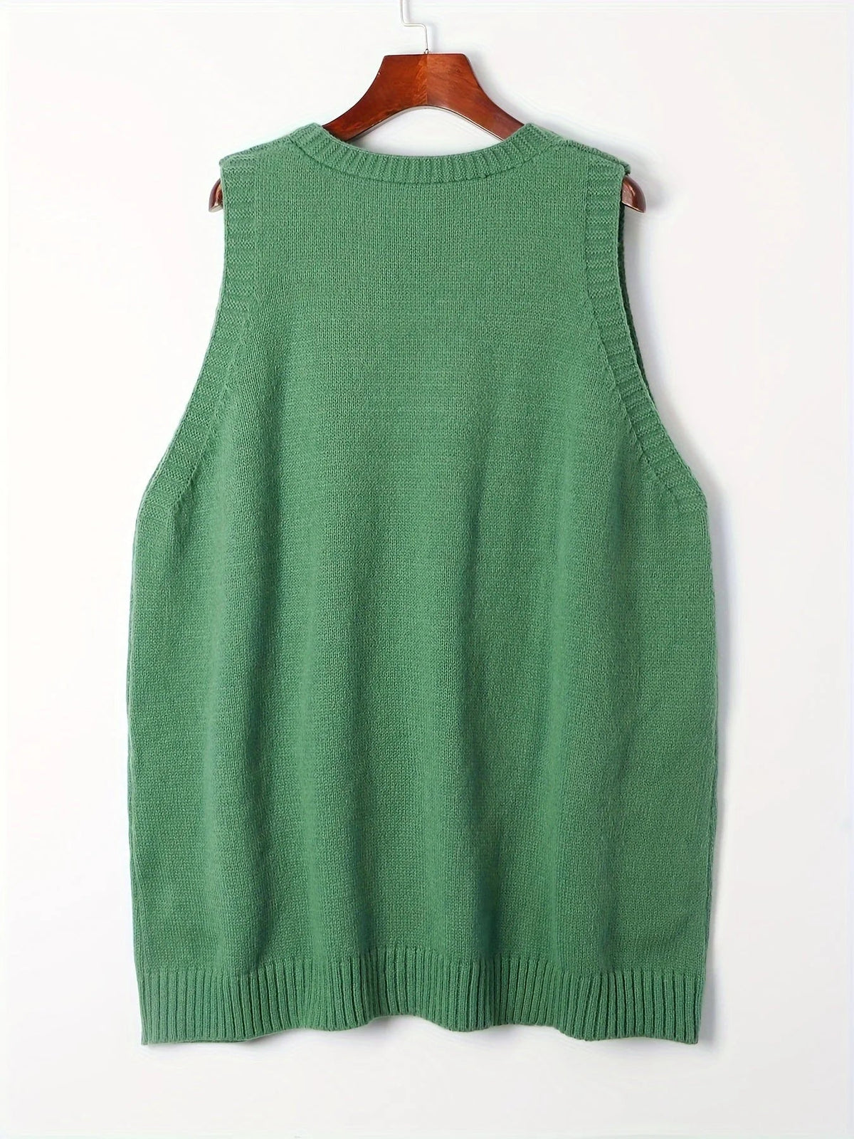 Women's oversized knit vest with V-neck sleeveless tunic length and patch pockets