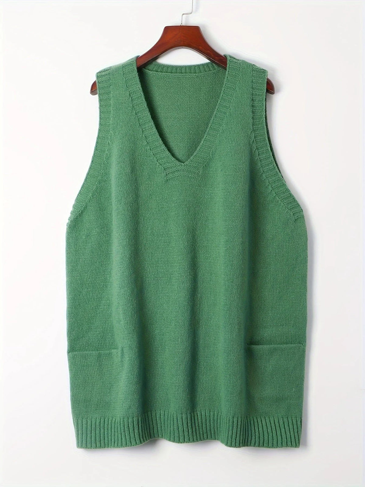 Women's oversized knit vest with V-neck sleeveless tunic length and patch pockets