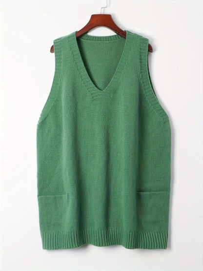 Women's oversized knit vest with V-neck sleeveless tunic length and patch pockets