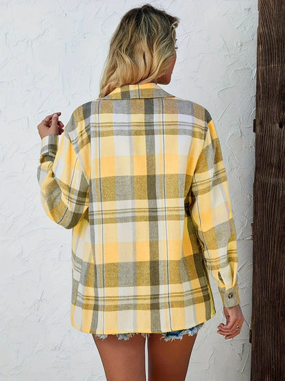 Women's oversized plaid flannel long-sleeve button-down shirt with chest pockets