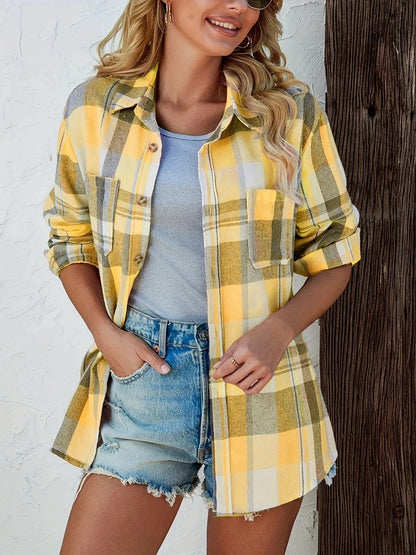 Women's oversized plaid flannel long-sleeve button-down shirt with chest pockets