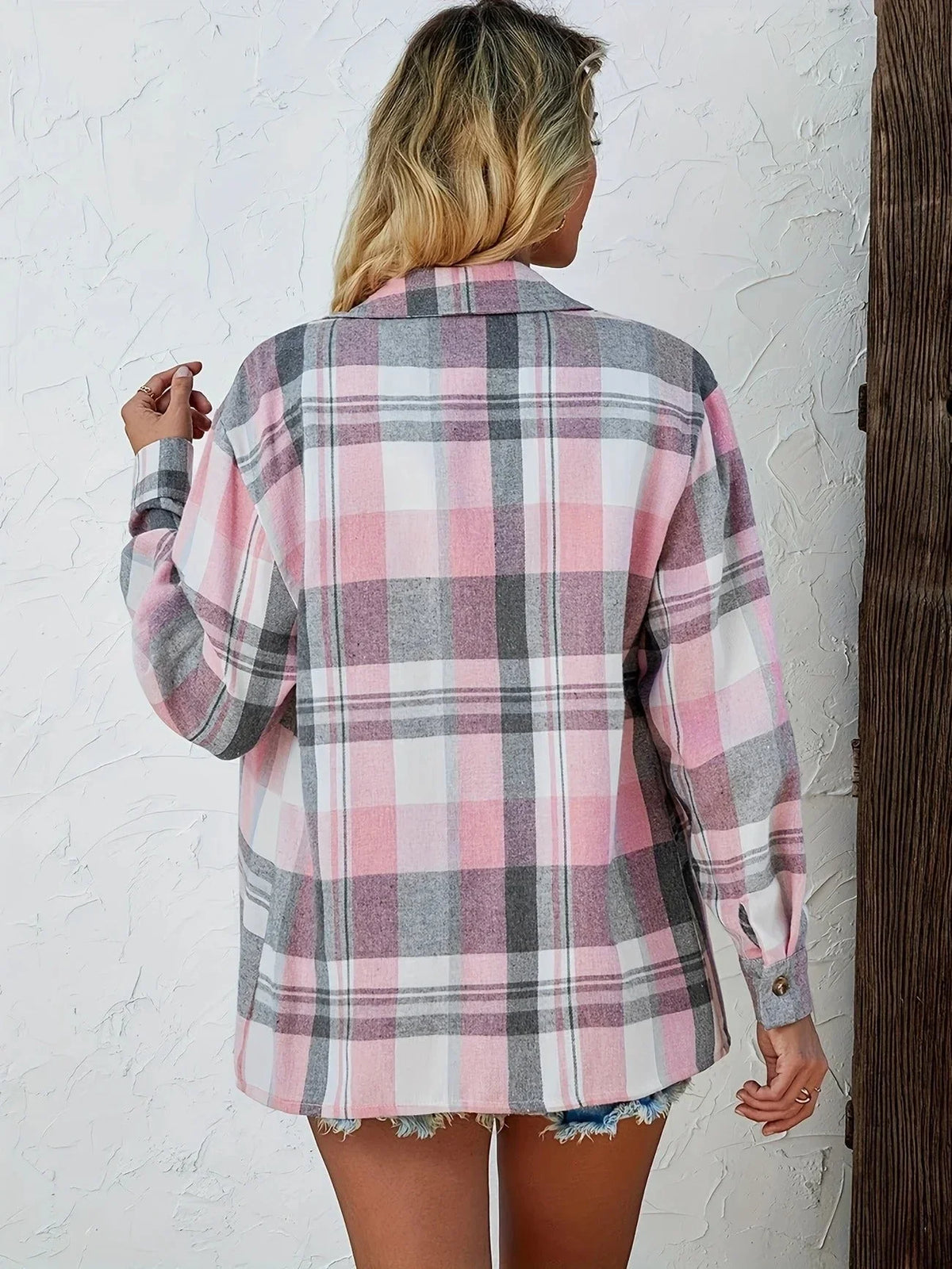 Women's oversized plaid flannel long-sleeve button-down shirt with chest pockets