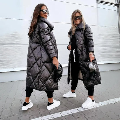 Women's padded long puffer coat with quilted design and stand-up collar