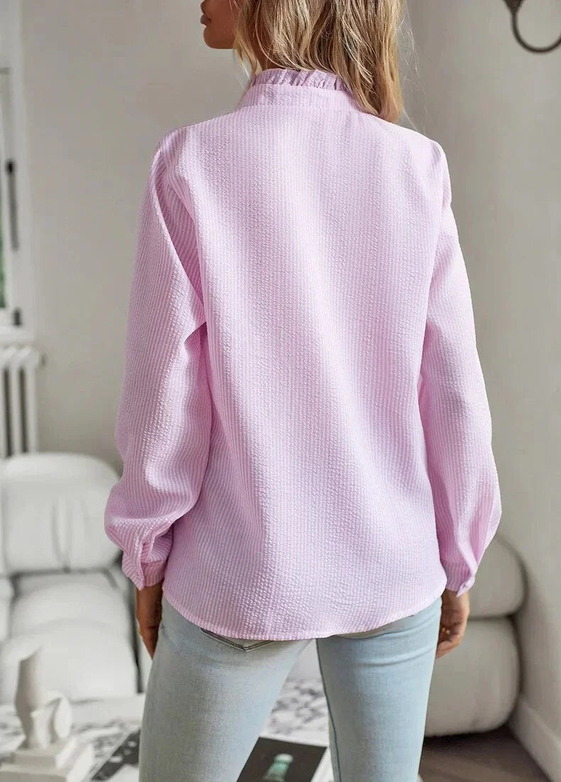 Women's pale textured striped blouse with long sleeves and ruffled stand-collar