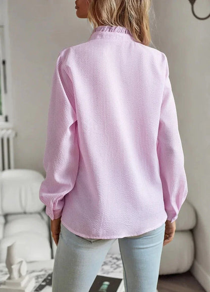 Women's pale textured striped blouse with long sleeves and ruffled stand-collar