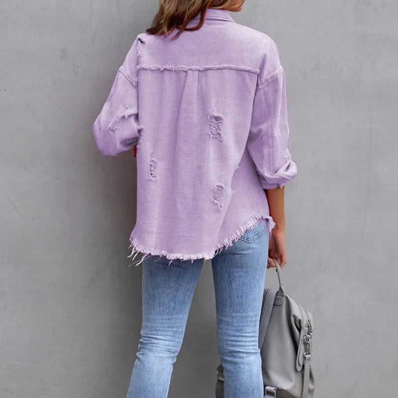 Women's distressed denim jacket with button-front and frayed hem