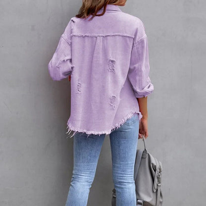 Women's distressed denim jacket with button-front and frayed hem