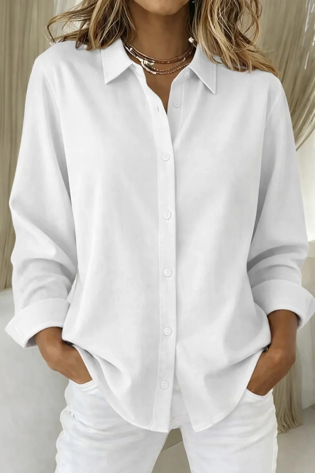 Women's long-sleeve collared blouse with button-front and contrast stitching – White