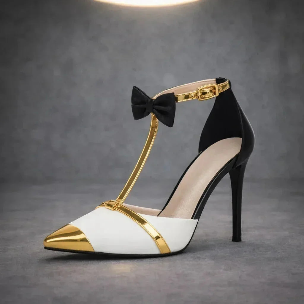 Women's pointed-toe T-strap stiletto heels with metallic tip and bow