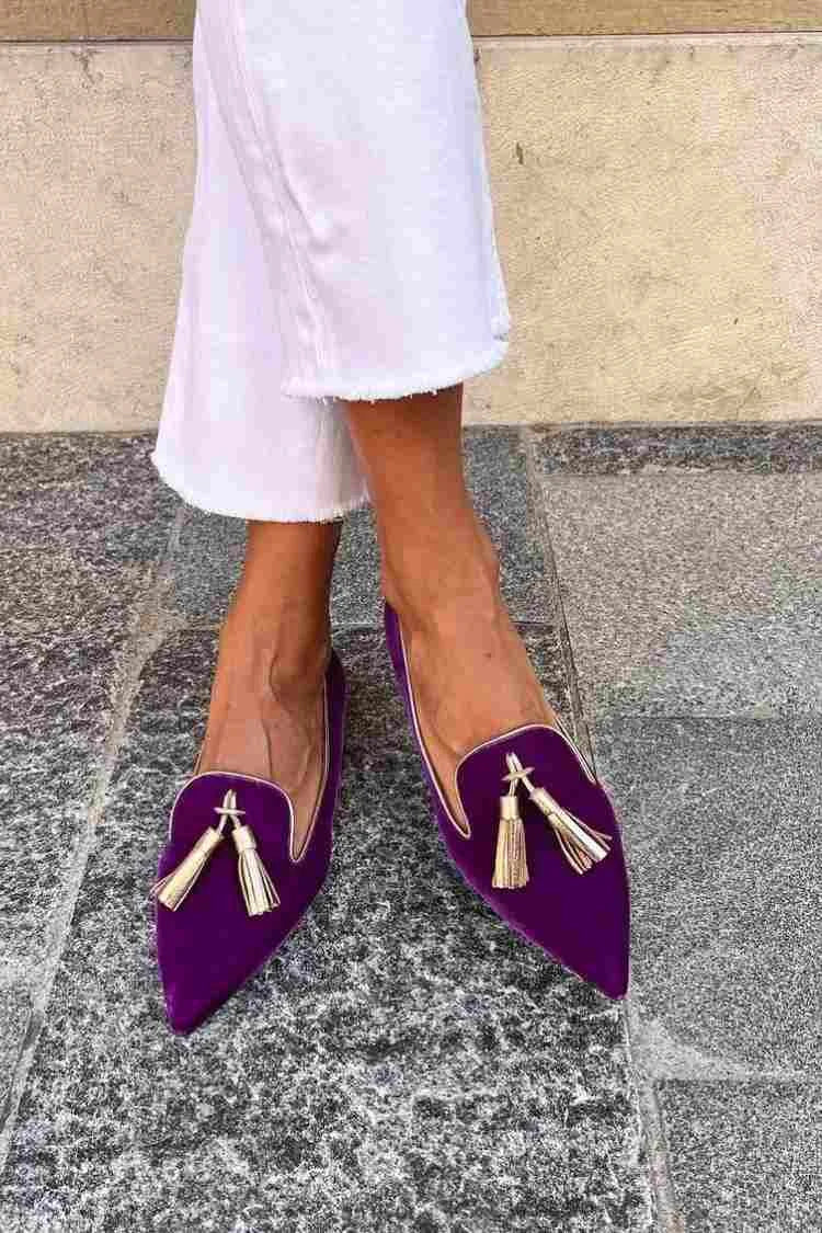 Women's suede pointed-toe slip-on loafers with tassels and contrast-trim