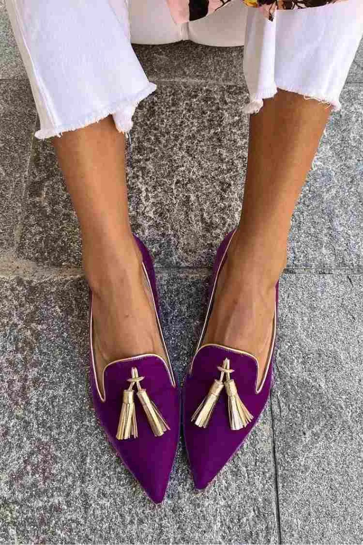 Women's suede pointed-toe slip-on loafers with tassels and contrast-trim