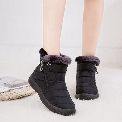 Women's quilted fur-lined winter ankle boots with soft sole and zipper