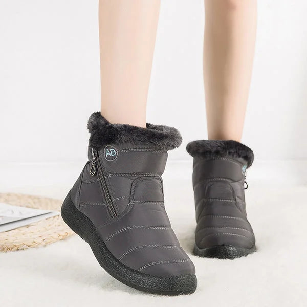 Women's quilted fur-lined winter ankle boots with soft sole and zipper