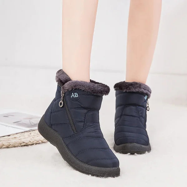 Women's quilted fur-lined winter ankle boots with soft sole and zipper