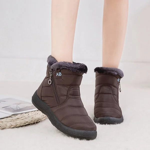 Women's quilted fur-lined winter ankle boots with soft sole and zipper
