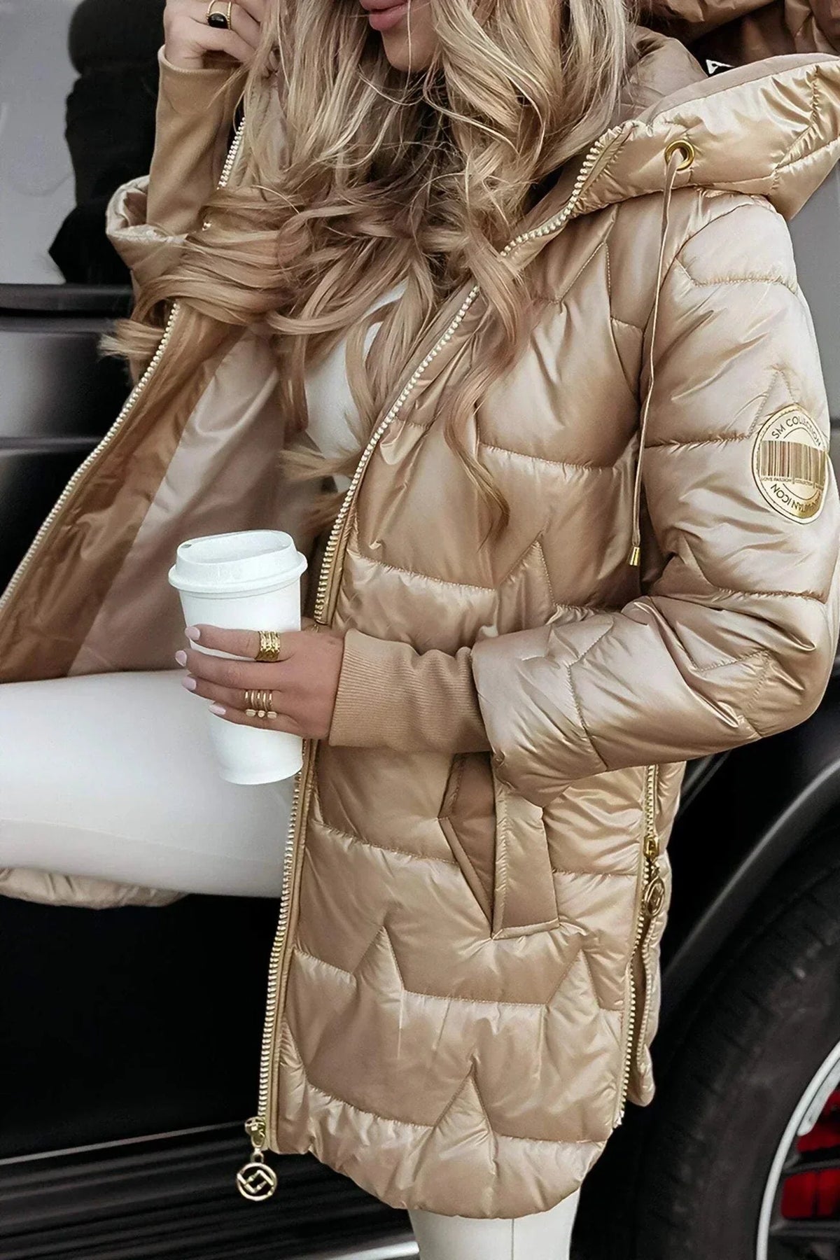 Women's quilted metallic hooded puffer jacket with full zip closure