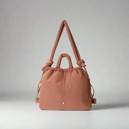 Women's quilted puffer tote bag with drawstring sides and knot-detail strap – Rose