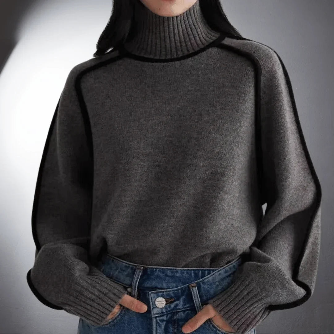 Women's relaxed-fit knit sweater with turtleneck and contrasting raglan sleeves
