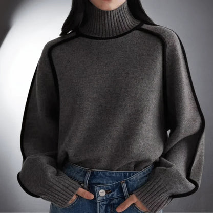 Women's relaxed-fit knit sweater with turtleneck and contrasting raglan sleeves