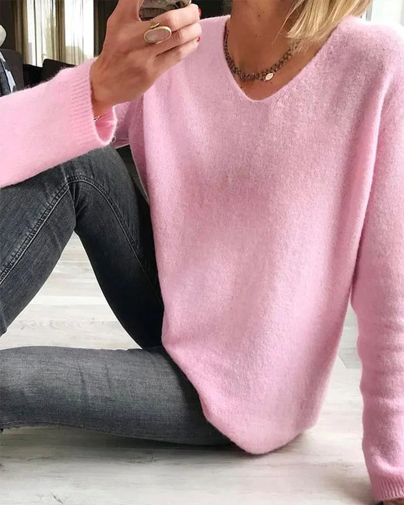 Women's relaxed fit knit sweater with V-neck long-sleeve design – Pink