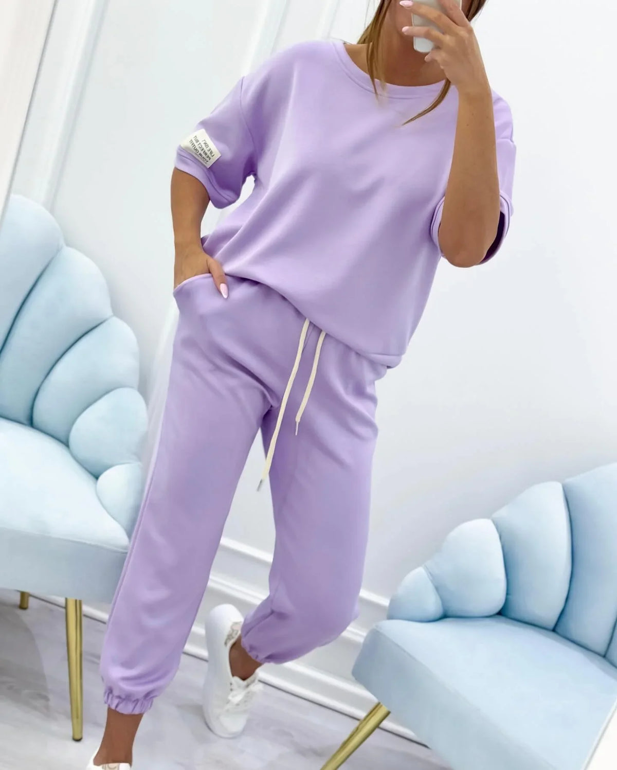 Women's relaxed fit knit two-piece set with short-sleeve top and cuffed joggers – Purple