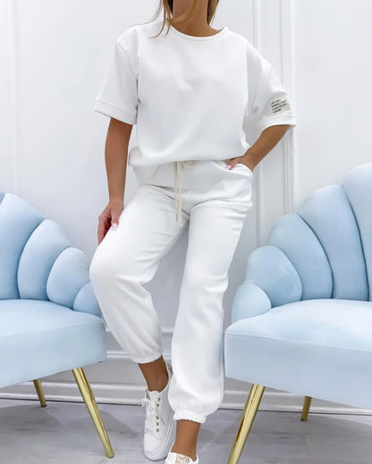 Women's relaxed fit knit two-piece set with short-sleeve top and cuffed joggers – White
