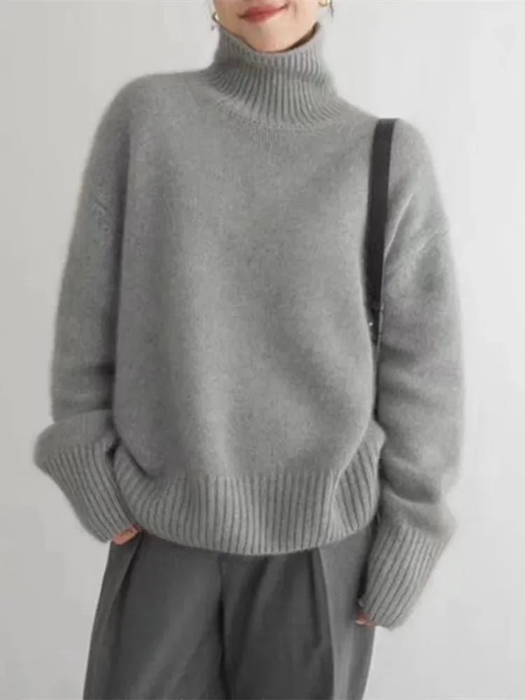 Women's relaxed-fit long-sleeve knit sweater with turtleneck and ribbed cuffs