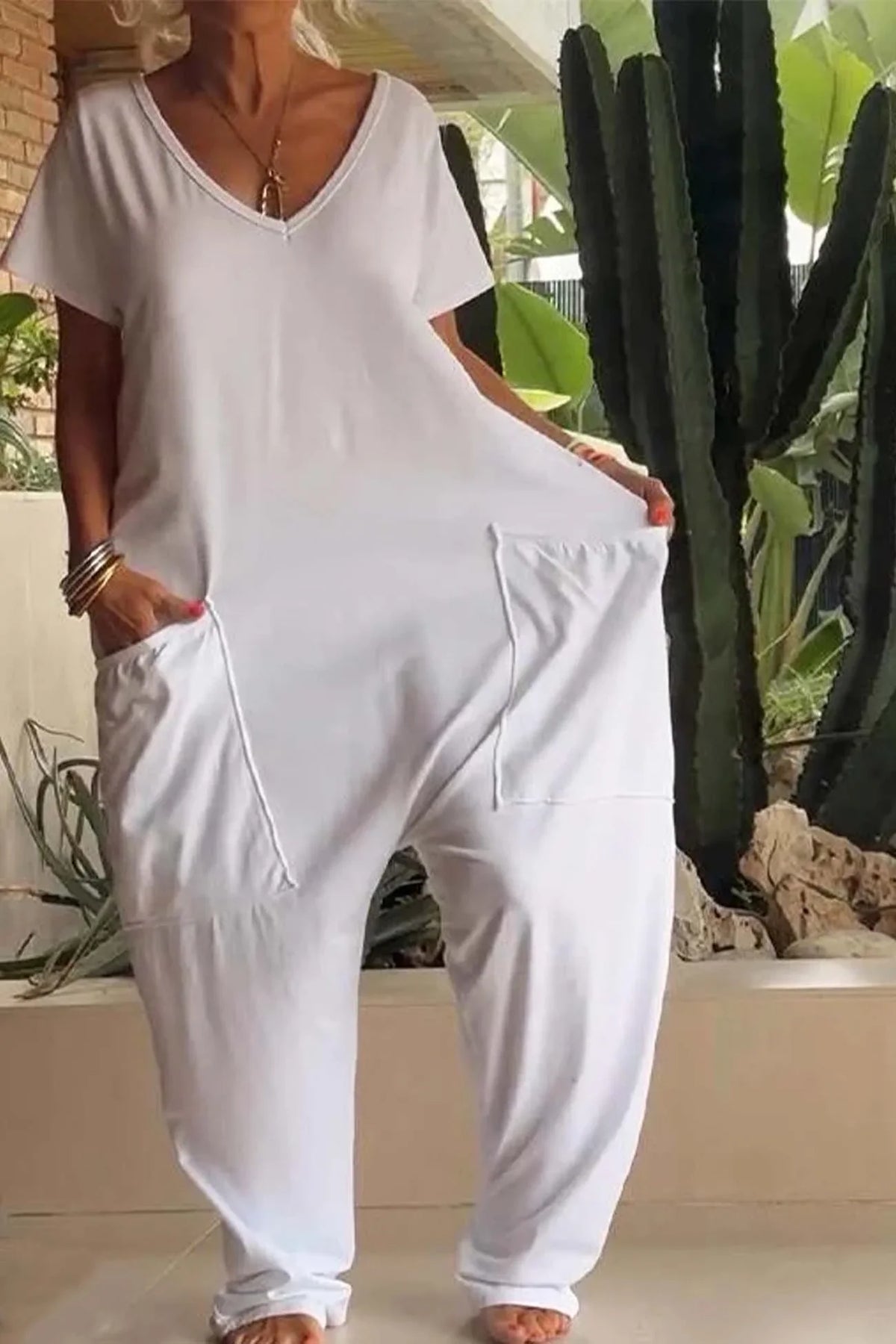 Women's relaxed knit jumpsuit with V-neck short sleeve and womens wide leg pants – White