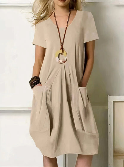 Women's relaxed midi dress with V-neck short-sleeve and pleated pockets – Beige
