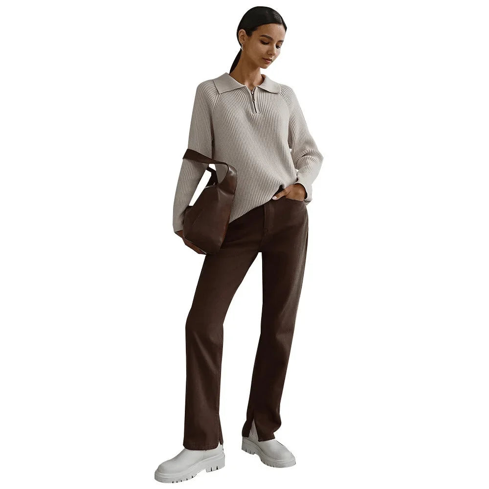 Women's ribbed knit sweater with half-zip polo collar and long raglan sleeves