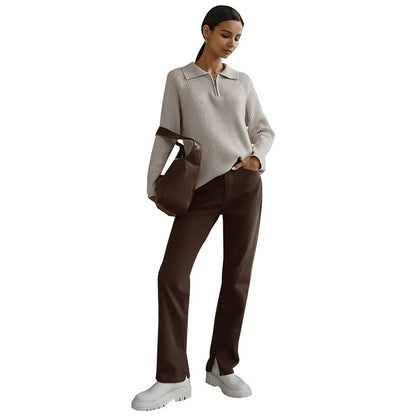 Women's ribbed knit sweater with half-zip polo collar and long raglan sleeves