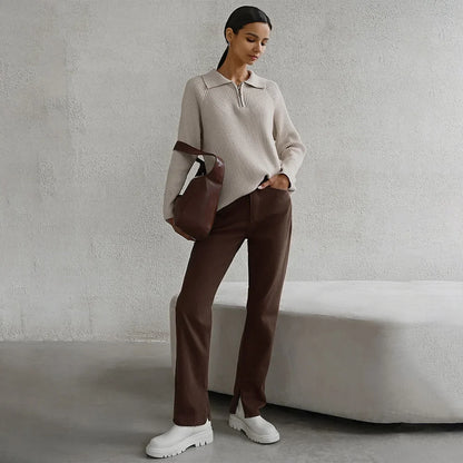Women's ribbed knit sweater with half-zip polo collar and long raglan sleeves