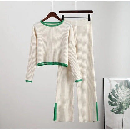 Women's ribbed knit two-piece set with a cropped knit sweater and wide-leg slit trousers