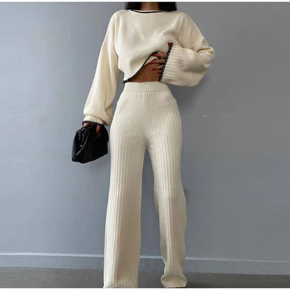 Women's ribbed knit two-piece set with a cropped knit sweater and wide-leg slit trousers