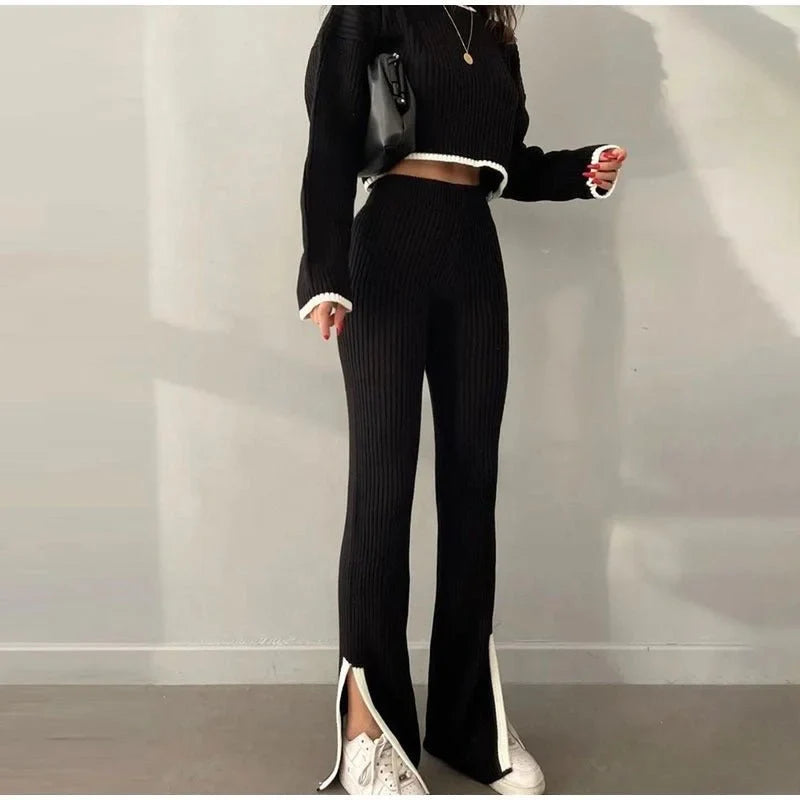 Women's ribbed knit two-piece set with a cropped knit sweater and wide-leg slit trousers – Black