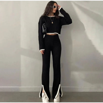 Women's ribbed knit two-piece set with a cropped knit sweater and wide-leg slit trousers