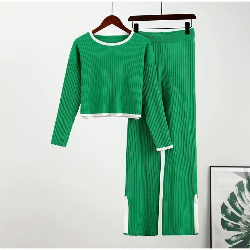 Women's ribbed knit two-piece set with a cropped knit sweater and wide-leg slit trousers