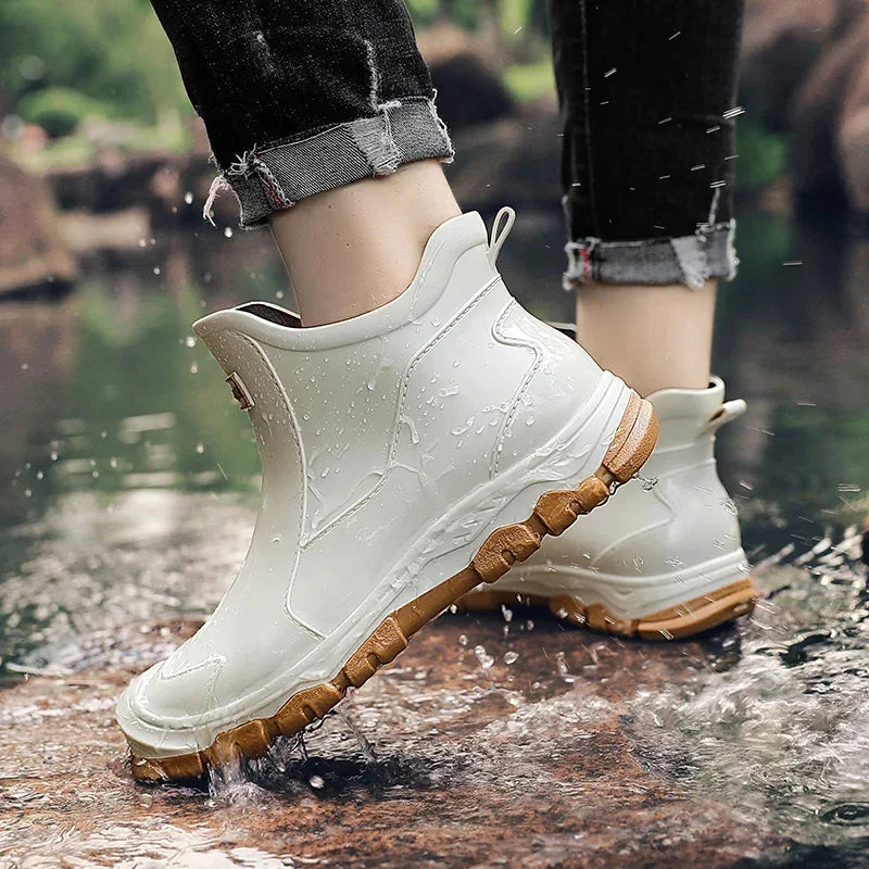 Women's rugged waterproof ankle rain boots with slip-resistant lug sole