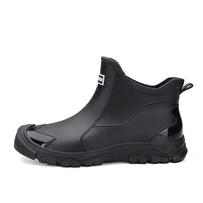 Women's rugged waterproof ankle rain boots with slip-resistant lug sole