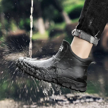 Women's rugged waterproof ankle rain boots with slip-resistant lug sole