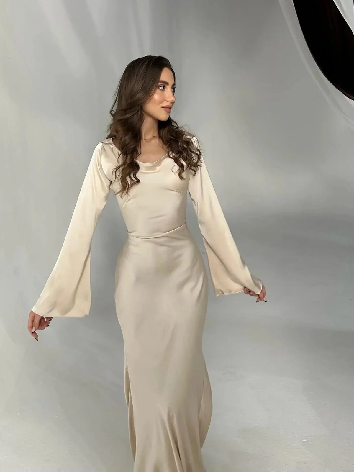 Women's satin fitted long-sleeve maxi dress with scoop neck and flared cuffs