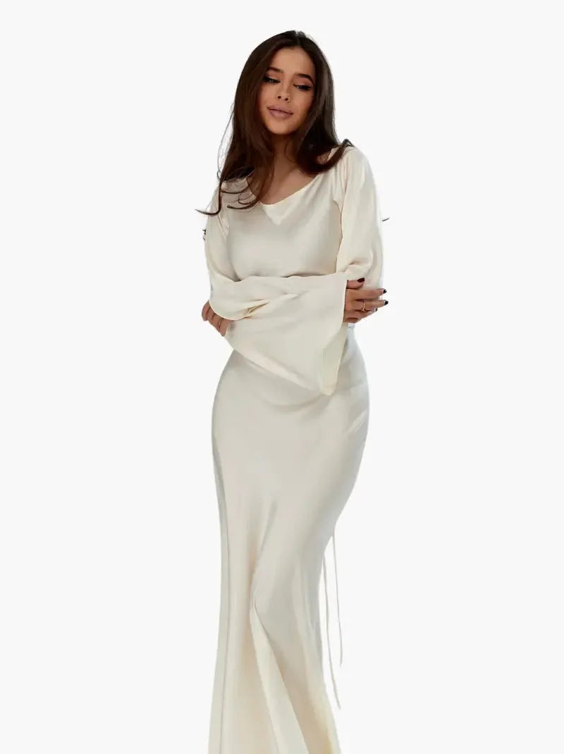 Women's satin fitted long-sleeve maxi dress with scoop neck and flared cuffs
